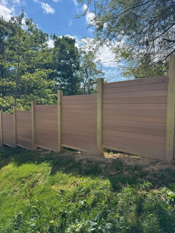 Fence and deck work in Lansing